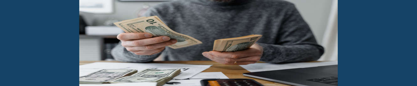 person holding cash